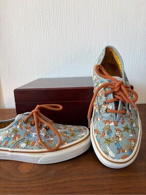 Vans x Disney Toy Story Woody Pattern Low-Top Sneakers in Light Blue and Orange